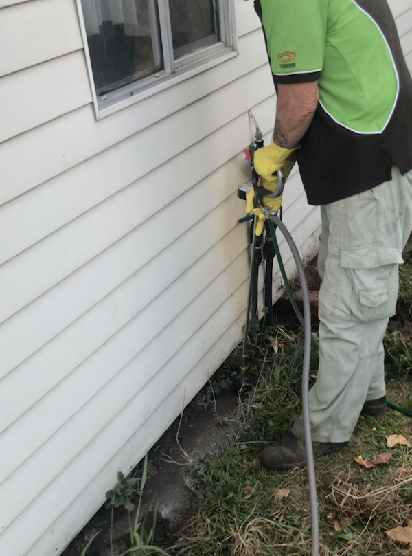 Injection of insecticides for termite soil treatment - termite barrier